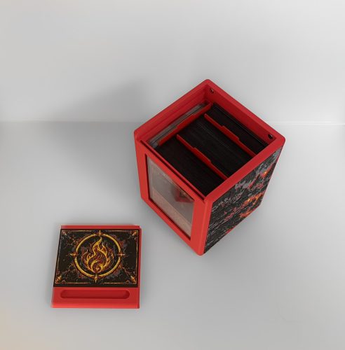 Open red Commander deck box showing the internal card storage compartment and separate display component.